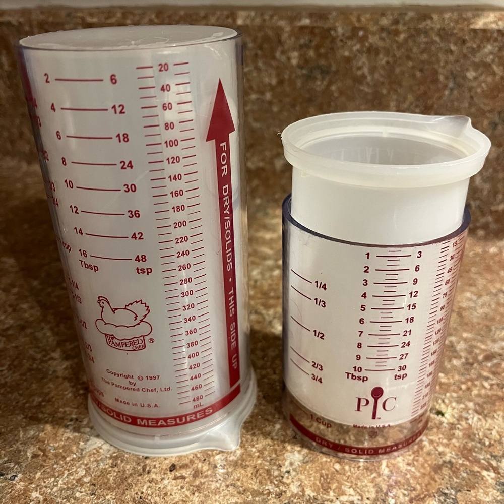 Pampered Chef Red and White Adjustable Measuring Set